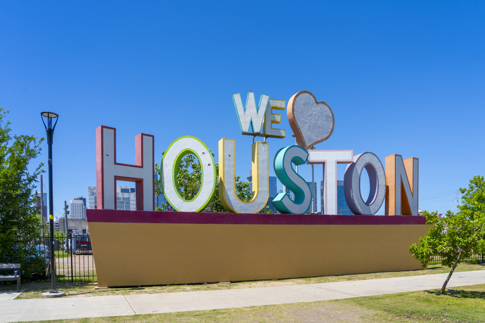 The sign ‘We Love Houston’ with Downtown Houston in background